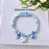 Adjustable Nylon Pet Collar with Bell and Camphor Wood Detail